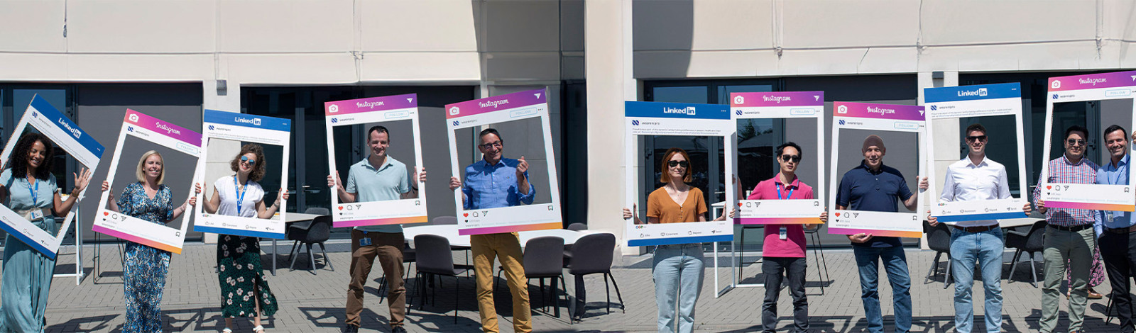 Nipro employees with frames